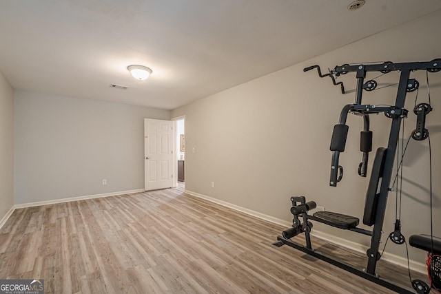 4096 Vinings Mill Trl SE, Smyrna, GA 30080 - workout room featuring light wood finished floors and baseboards