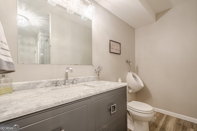 4096 Vinings Mill Trl SE, Smyrna, GA 30080 - bathroom featuring toilet, vanity, wood finished floors, and baseboards