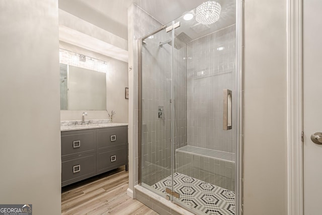 4096 Vinings Mill Trl SE, Smyrna, GA 30080 - bathroom with vanity, a shower stall, and wood finished floors