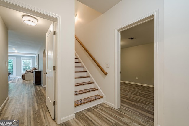 4096 Vinings Mill Trl SE, Smyrna, GA 30080 - stairway with wood finished floors and baseboards