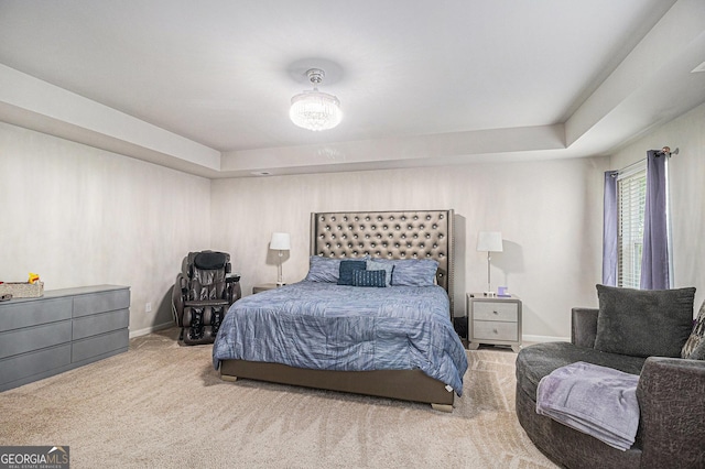 210 Kestrel Cir, Covington, GA 30014 - carpeted bedroom featuring baseboards and a tray ceiling