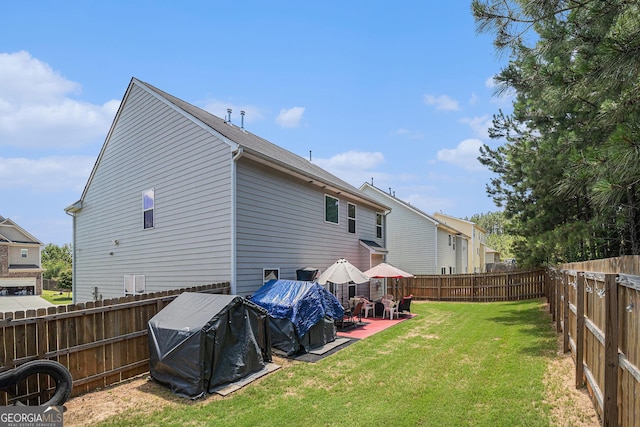 210 Kestrel Cir, Covington, GA 30014 - rear view of property featuring a fenced backyard