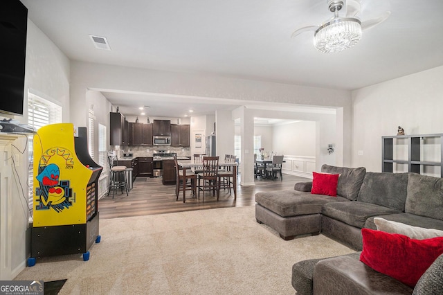 210 Kestrel Cir, Covington, GA 30014 - living room featuring wood finished floors and carpet floors