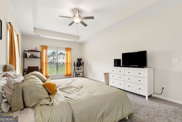102 Olson Way, Kingsland, GA 31548 - carpeted bedroom with a raised ceiling, baseboards, and ceiling fan