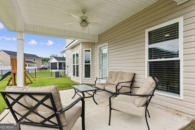 102 Olson Way, Kingsland, GA 31548 - view of patio / terrace featuring an outdoor living space, ceiling fan, central AC, a residential view, and a playground