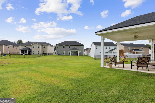 102 Olson Way, Kingsland, GA 31548 - view of yard featuring a residential view, a ceiling fan, and a patio area