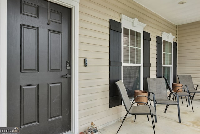 102 Olson Way, Kingsland, GA 31548 - property entrance featuring a porch