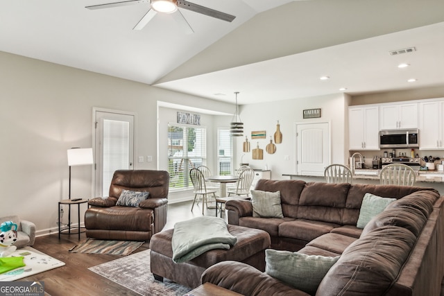 102 Olson Way, Kingsland, GA 31548 - living room featuring a ceiling fan, vaulted ceiling, dark wood finished floors, baseboards, and recessed lighting