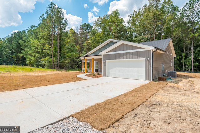 246 Stephens Rd, Cedartown, GA 30125 - view of front facade with a garage, driveway, and board and batten siding