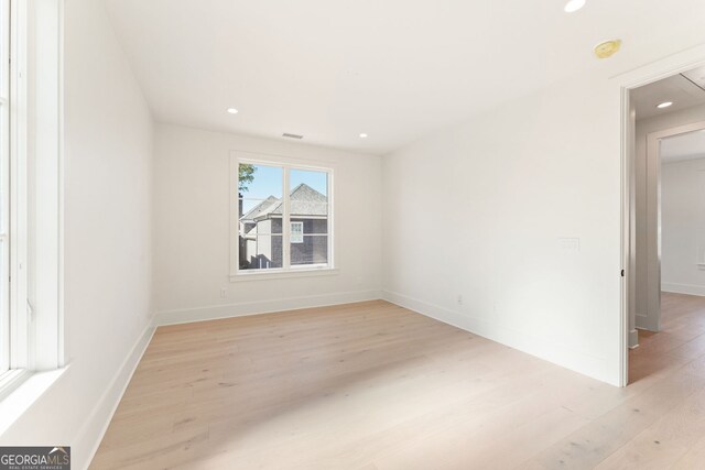 260 Guild Ln, Fayetteville, GA 30214 - spare room featuring light wood-type flooring, recessed lighting, and a smoke detector