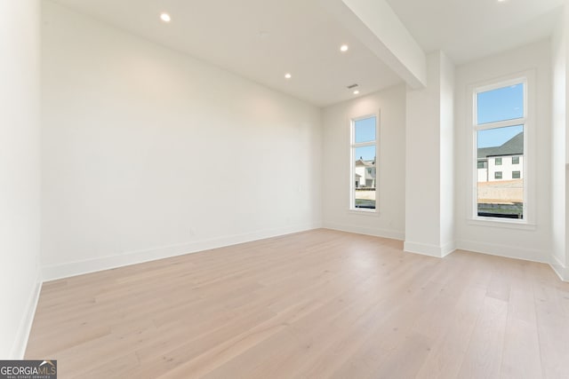 260 Guild Ln, Fayetteville, GA 30214 - spare room with healthy amount of natural light, light wood finished floors, and recessed lighting