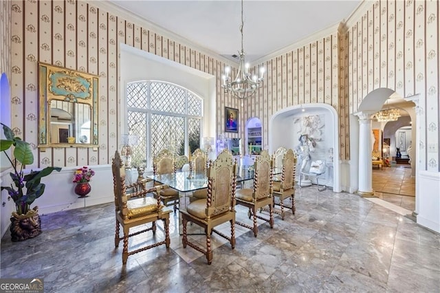 3000 Cathedral Pl, Decatur, GA 30034 - dining room with arched walkways, wallpapered walls, crown molding, a chandelier, and ornate columns