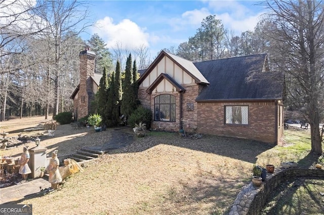 3000 Cathedral Pl, Decatur, GA 30034 - english style home featuring brick siding, a chimney, and a shingled roof