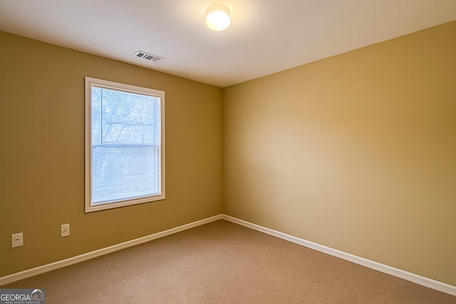 2650 Batavia St, East Point, GA 30344 - empty room with carpet flooring and baseboards