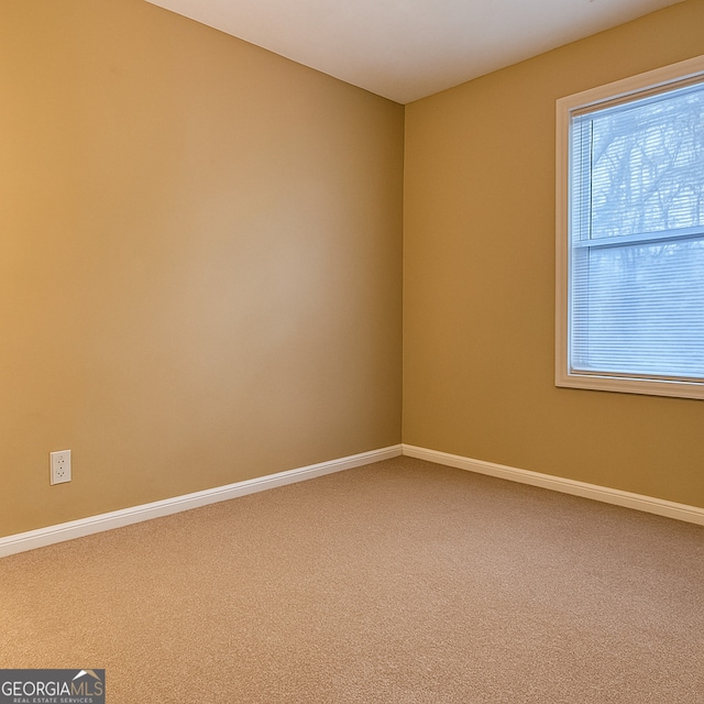 2650 Batavia St, East Point, GA 30344 - carpeted spare room featuring baseboards