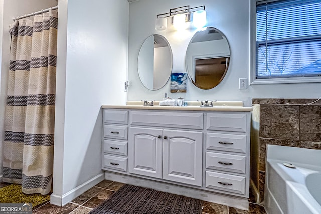 2650 Batavia St, East Point, GA 30344 - full bath with double vanity, a garden tub, and curtained shower