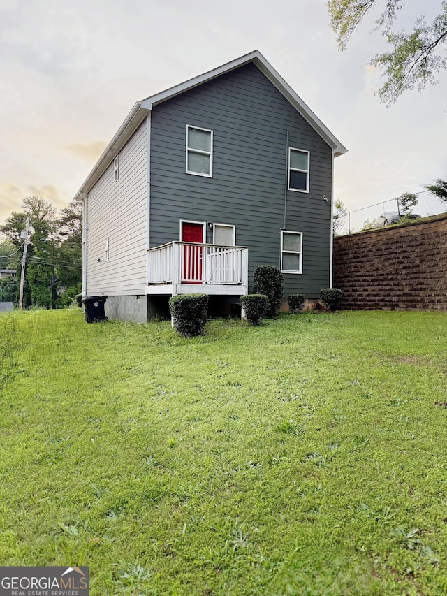 2650 Batavia St, East Point, GA 30344 - rear view of house with a lawn