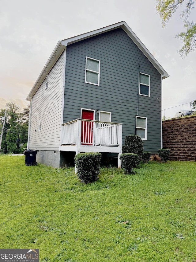 2650 Batavia St, East Point, GA 30344 - back of property featuring a yard and a deck