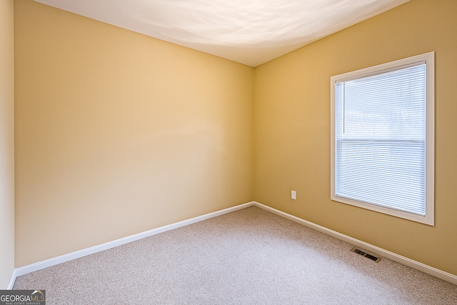 2650 Batavia St, East Point, GA 30344 - carpeted spare room featuring baseboards