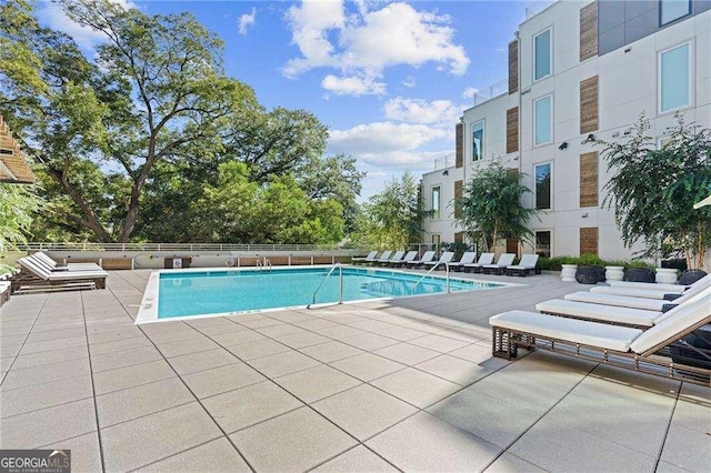 775 Juniper St NE Unit 111, Atlanta, GA 30308 - community pool featuring a patio area