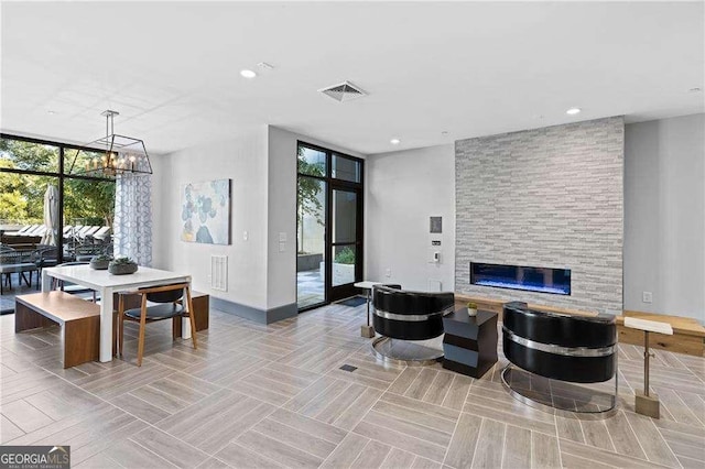 775 Juniper St NE Unit 111, Atlanta, GA 30308 - community lobby featuring floor to ceiling windows and recessed lighting