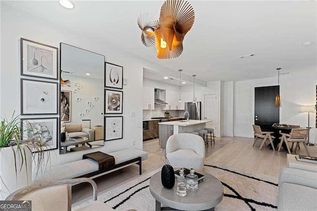 775 Juniper St NE Unit 111, Atlanta, GA 30308 - living room featuring recessed lighting and light wood-type flooring