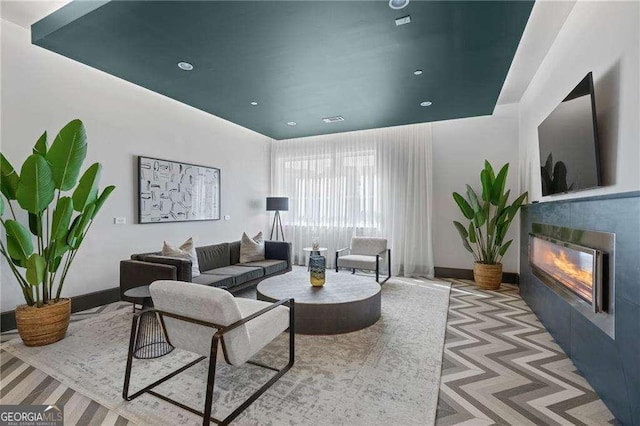 775 Juniper St NE Unit 111, Atlanta, GA 30308 - living room with a tile fireplace and recessed lighting