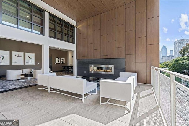 775 Juniper St NE Unit 111, Atlanta, GA 30308 - view of patio featuring an outdoor living space with a fireplace and a city view