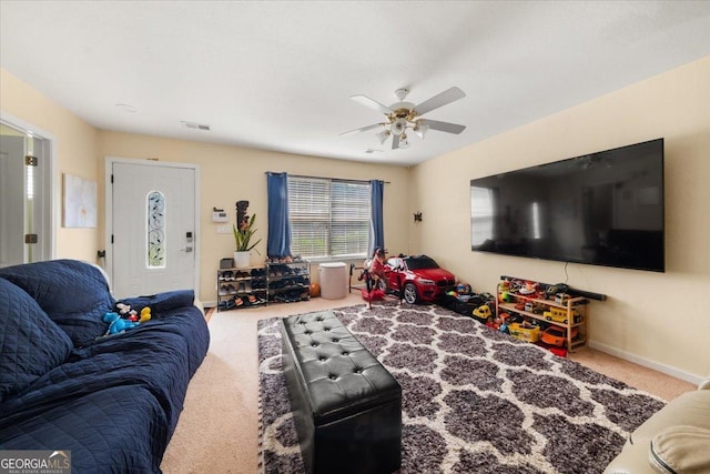 1955 Shawn Wayne Cir SE, Atlanta, GA 30316 - carpeted living room featuring a ceiling fan and baseboards