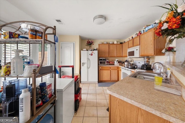 1955 Shawn Wayne Cir SE, Atlanta, GA 30316 - kitchen with white appliances, light countertops, and light tile patterned flooring