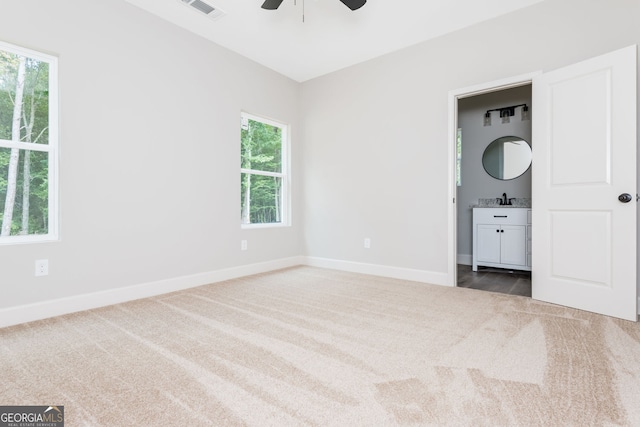 232 Stephens Rd, Cedartown, GA 30125 - unfurnished bedroom with carpet floors, ensuite bathroom, and a ceiling fan