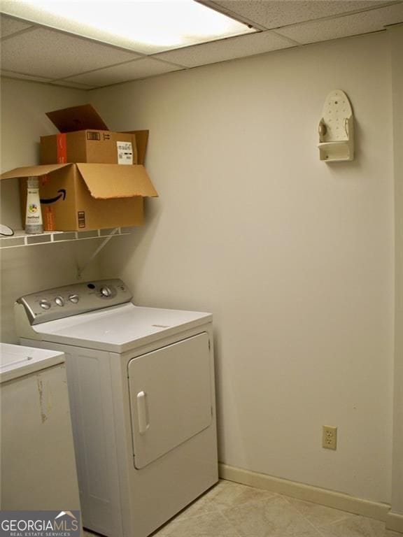 219 Park Ave, Woodstock, GA 30188 - washroom with washing machine and dryer and baseboards