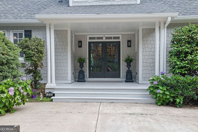 2216 Trammel Rd, Cumming, GA 30041 - view of exterior entry with a shingled roof, french doors, and a porch