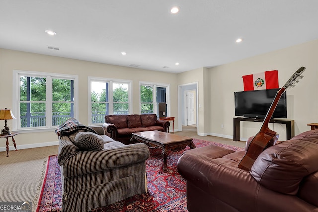 2216 Trammel Rd, Cumming, GA 30041 - living area with light carpet, plenty of natural light, and recessed lighting
