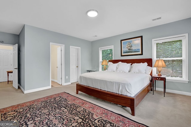 2216 Trammel Rd, Cumming, GA 30041 - bedroom featuring light carpet and baseboards
