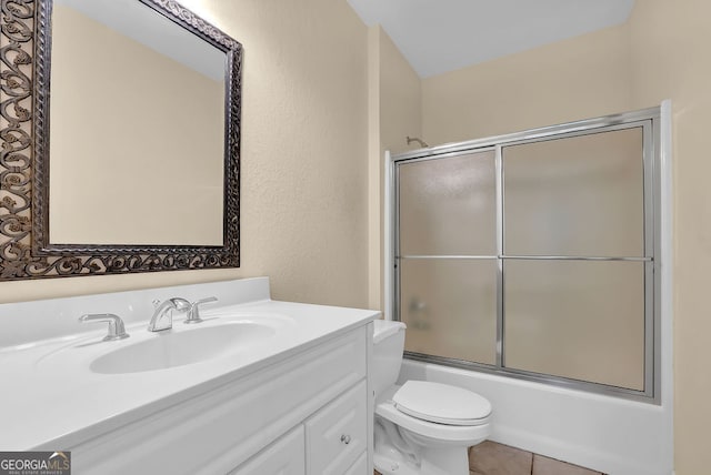 2216 Trammel Rd, Cumming, GA 30041 - bathroom with vanity, enclosed tub / shower combo, and tile patterned flooring