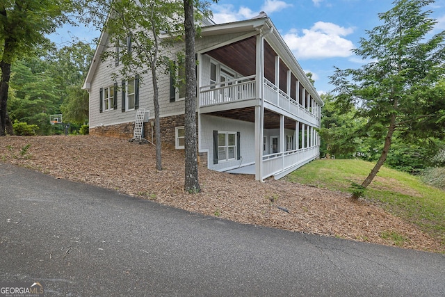 2216 Trammel Rd, Cumming, GA 30041 - view of side of property with a balcony