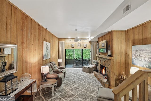 251 Shakespeare Dr Unit 332, Clayton, GA 30525 - living room featuring wooden walls and a fireplace