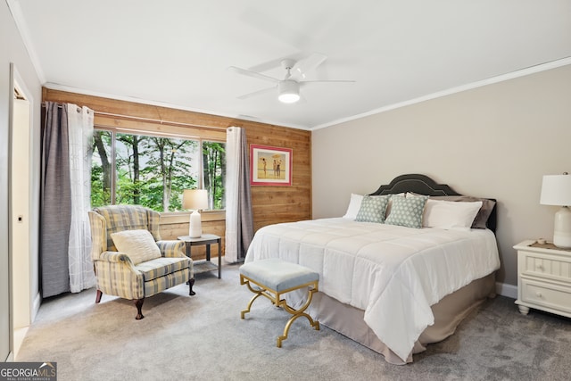 251 Shakespeare Dr Unit 332, Clayton, GA 30525 - carpeted bedroom featuring ornamental molding, wood walls, and a ceiling fan