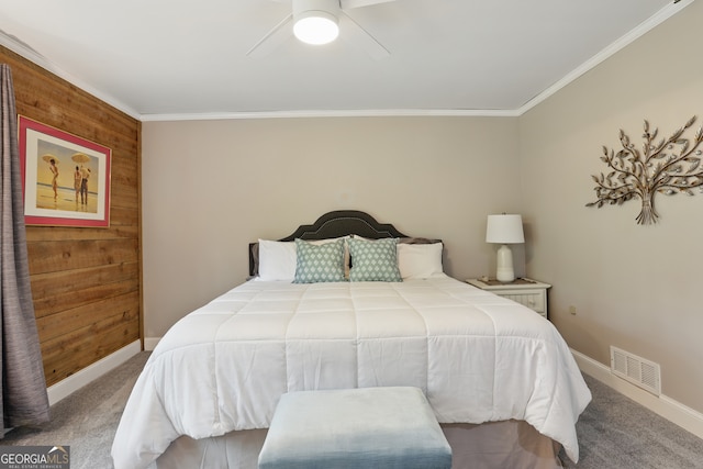 251 Shakespeare Dr Unit 332, Clayton, GA 30525 - bedroom with crown molding, carpet, wooden walls, and ceiling fan