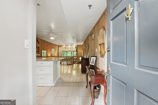 251 Shakespeare Dr Unit 332, Clayton, GA 30525 - foyer featuring ceiling fan and wood walls