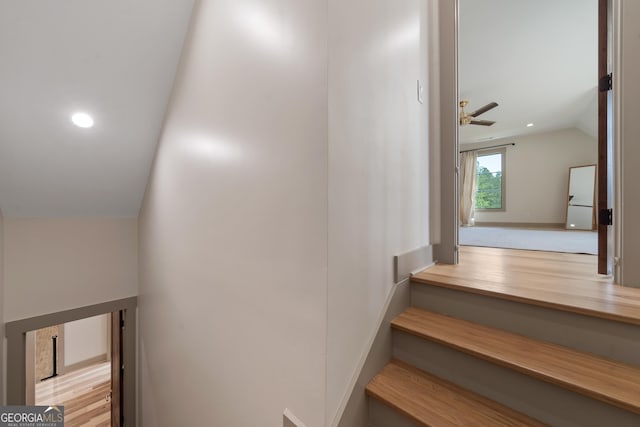 5700 Goolsby Rd, Monticello, GA 31064 - stairway featuring lofted ceiling, a ceiling fan, recessed lighting, and wood finished floors