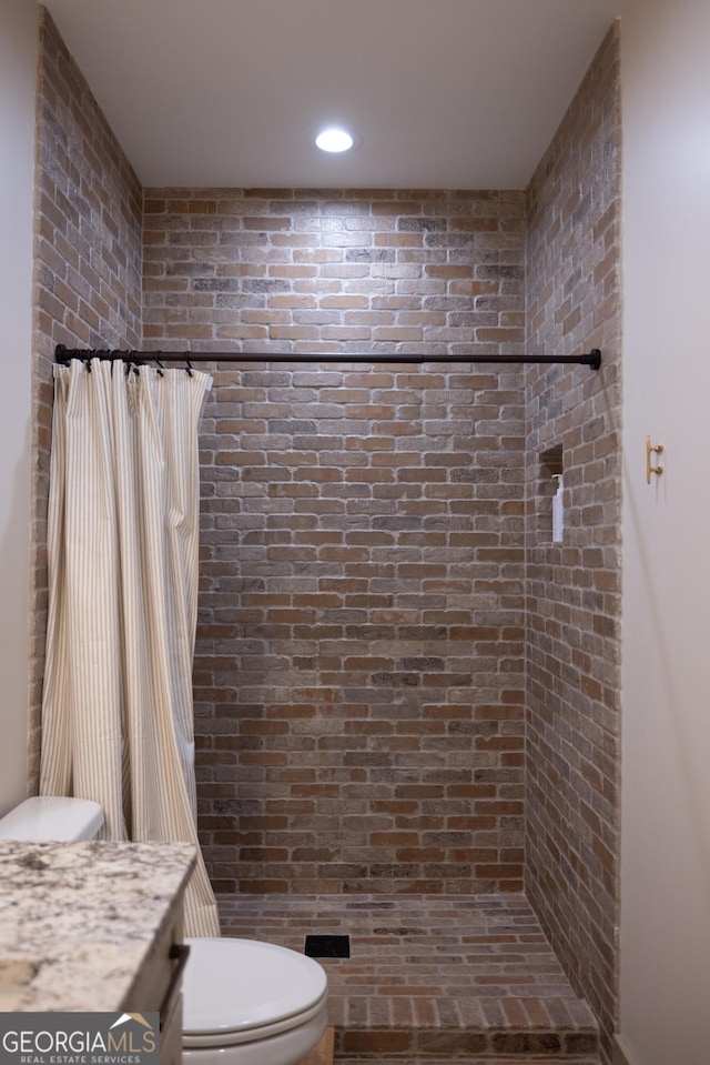 5700 Goolsby Rd, Monticello, GA 31064 - full bath with tiled shower, vanity, toilet, and recessed lighting