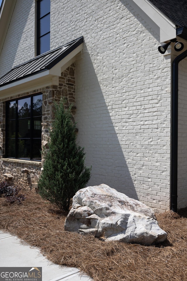 5700 Goolsby Rd, Monticello, GA 31064 - view of home's exterior with a standing seam roof and metal roof