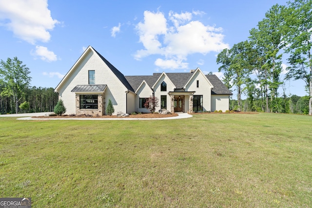 5700 Goolsby Rd, Monticello, GA 31064 - modern inspired farmhouse with a front lawn and stone siding
