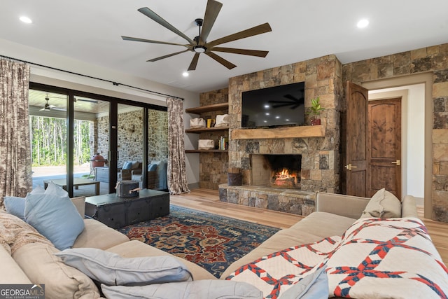 5700 Goolsby Rd, Monticello, GA 31064 - living room featuring ceiling fan, wood finished floors, a fireplace, and recessed lighting
