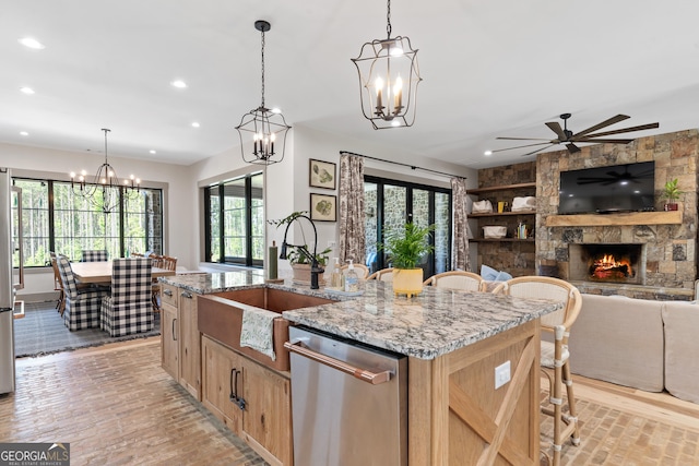 5700 Goolsby Rd, Monticello, GA 31064 - kitchen featuring appliances with stainless steel finishes, a sink, plenty of natural light, a kitchen island with sink, and recessed lighting