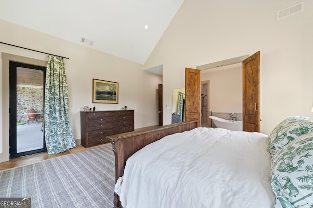 5700 Goolsby Rd, Monticello, GA 31064 - bedroom featuring access to outside, high vaulted ceiling, and wood finished floors