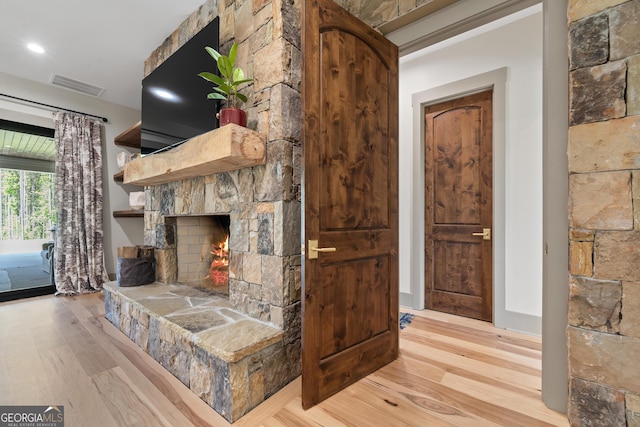 5700 Goolsby Rd, Monticello, GA 31064 - living area with wood finished floors and a fireplace