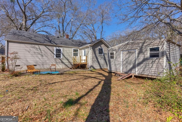 380 Best Dr, Athens, GA 30606 - rear view of property with crawl space, a chimney, and a shed